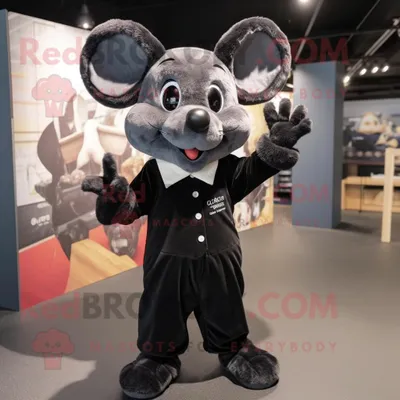 Produktbild von Maskottchen REDBROKOLY kostüm der schwarzen Maus bekleidet mit einer Bluse und Uhren