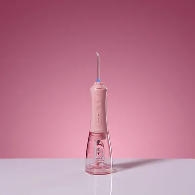 Obrázok produktu pre Bezdrôtový irrigátor Smilesonic Aquiflow, ružová farba, 5 trysiek, tlak 2,75-7,6 bar, AquaFlow
