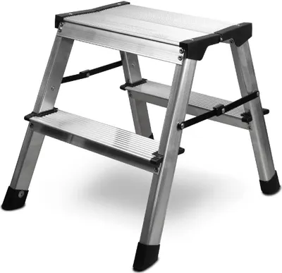 A silver and black aluminum step stool with two steps is shown against a white background.
