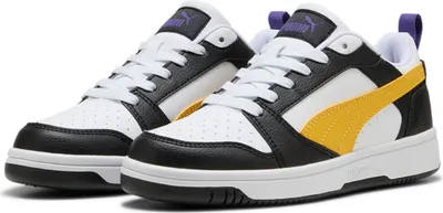 A pair of Puma Rebound children's sneakers.