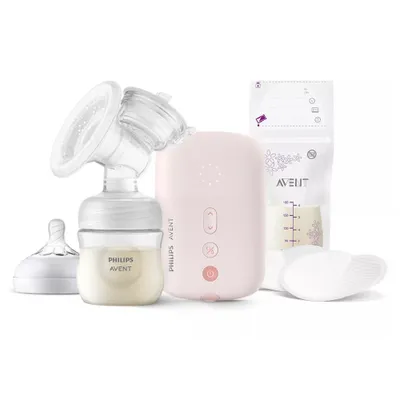 A breast pump kit with accessories, laid out on a white background.