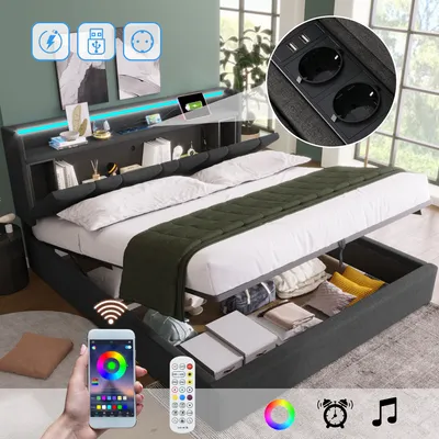 A modern bed with storage, featuring LED lighting and integrated charging ports, shown in a bedroom setting with a smartphone controlling the lights.