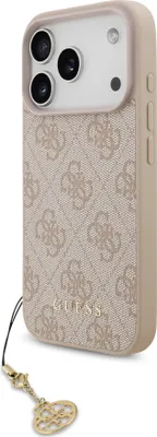 A close-up, angled view of a pink and beige Guess brand iPhone case with a gold charm attached to a lanyard.