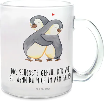 Produktbild von Mr. & Mrs. Panda Häferl Pinguine Kuscheln - Transparent - Geschenk, Henkeltasse, Tee Tasse, Trinkglas, Jahrestag, Hochzeitstag, Teeglas, für Partner, Freundin, Freund