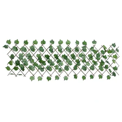 A decorative trellis covered in artificial ivy leaves.