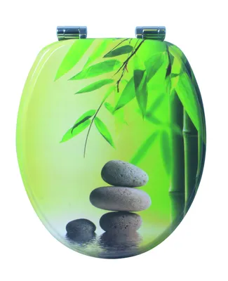 A toilet seat with a bamboo and stone design.