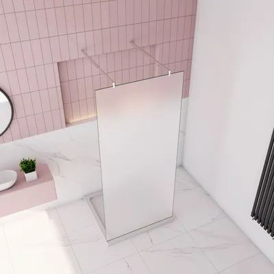 A modern bathroom with a walk-in shower enclosure.
