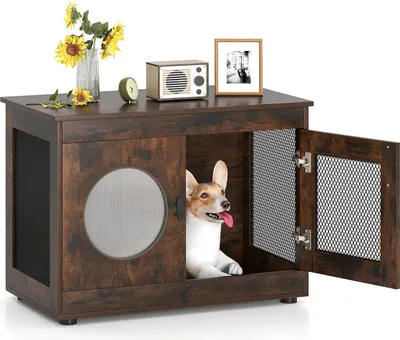 A dog is inside a wooden dog crate that is styled like furniture. The crate has a door and a circular window.