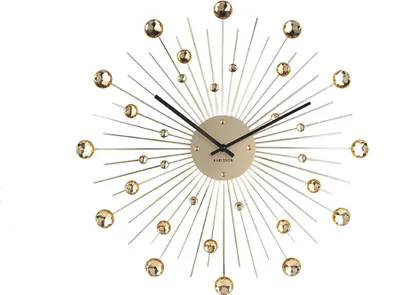 A decorative wall clock with a sunburst design.