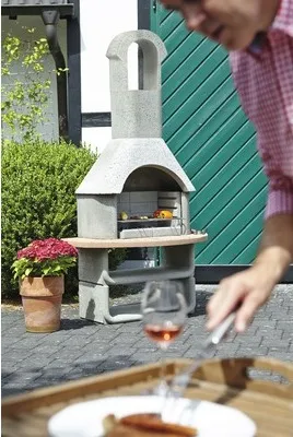 Produktbild von Buschbeck Grillkamin Siena, rustikaler Gartenkamin aus naturgrauem Feuerbeton