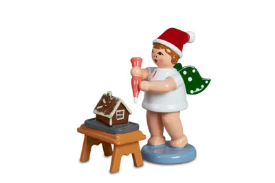 Produktbild von Holzfigur Bäckerengel mit Tortenspritze Pfefferkuchenhaus und Mütze Höhe 6cm NEU