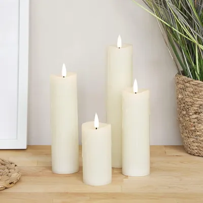 Produktbild von Lights4fun 4er Set TruGlow® LED Echtwachskerzen mit Fernbedienung und Timer Kerzen mit Wachstropfen batteriebetrieb