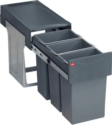 A pull-out trash bin system with three compartments.