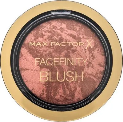 A top-down view of a round makeup compact containing blush.