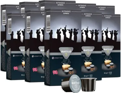 Multiple boxes of Martello Kaffee INTENSIVO coffee capsules are stacked together, with some individual capsules shown in the foreground.