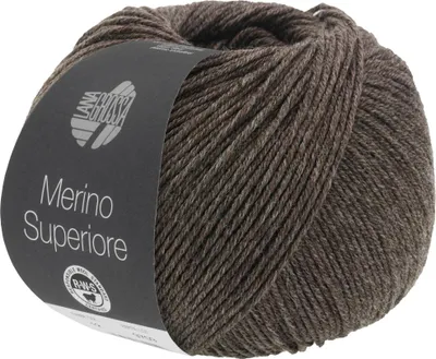 A ball of brown yarn with a label.