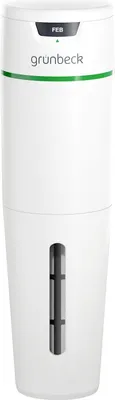 A white cylindrical water filter with a green band and a small display window.