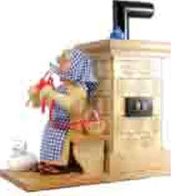 Imagen del producto de Figura decorativa de "Abuelita" junto al horno. Dimensiones: 9 x 21 x 19,5 cm. Producto nuevo