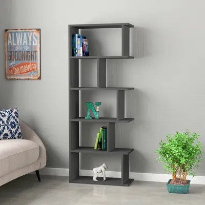 A modern gray bookshelf with various decorative items and books.