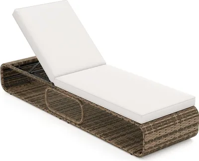A white chaise lounge with a brown rattan frame, shown on a white background.