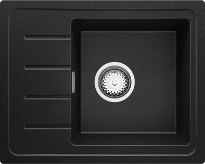 A top-down view of a black granite kitchen sink with a silver drain.