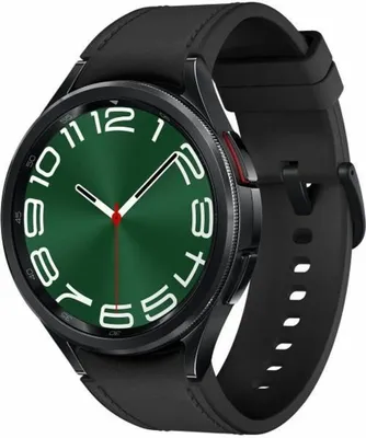A close-up studio shot of a black smartwatch with a green watch face and white numbers.
