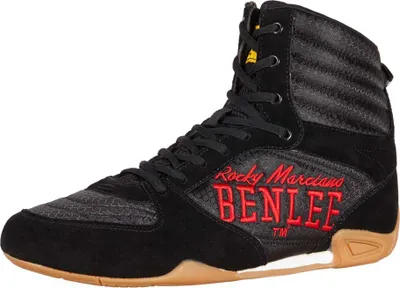 A single black boxing shoe with red accents and branding is shown against a white background.