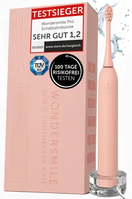 A pink Wondersmile Pro sonic toothbrush and its packaging are displayed. The packaging highlights awards and testing information.