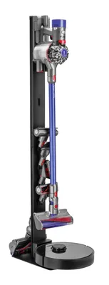 A black vacuum cleaner stand with a blue Dyson vacuum cleaner docked on it.