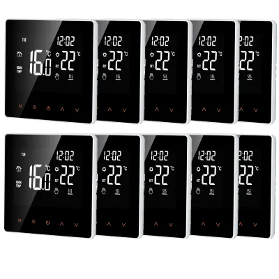 A collection of digital thermostats arranged in two rows.