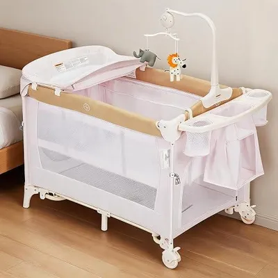 Imagen del producto de Cuna de viaje para bebés 4 en 1, parque infantil con cambiador integrado
