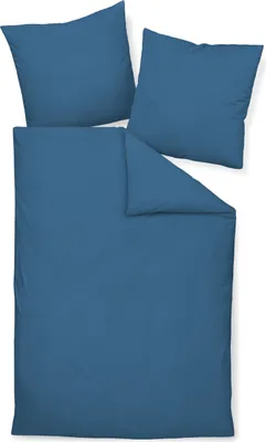 A blue duvet cover and two pillowcases are laid out on a white background.