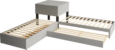 A modular bed frame with a pull-out trundle and a storage ottoman, shown from a diagonal angle against a white background.