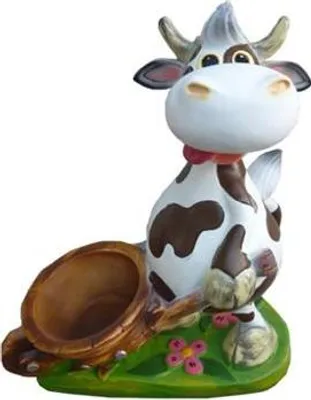 Immagine prodotto di Bella scultura di design di una mucca, altezza figura 38 cm.