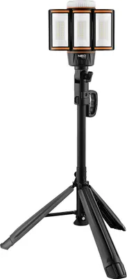 A portable LED work light with a tripod stand.