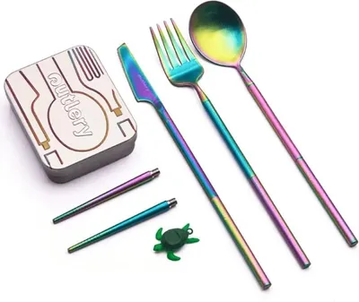 A set of rainbow-colored cutlery and a case, along with two small green accessories, laid out on a white background.
