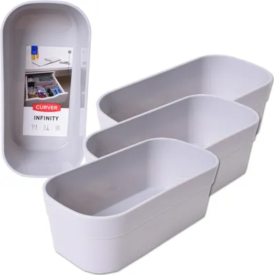 Three gray rectangular storage boxes are arranged diagonally, with one box in the foreground and two behind it. A fourth box, showing packaging and a label, is positioned to the left.