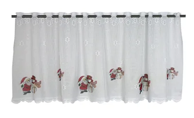 A white lace curtain with embroidered Christmas figures.