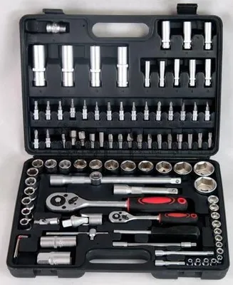 A black plastic tool case filled with various metal tools, including sockets, ratchets, and extensions.