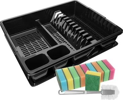 A black plastic dish rack with compartments for dishes and cutlery, along with a set of colorful sponges and a scrub brush, is displayed on a white background.