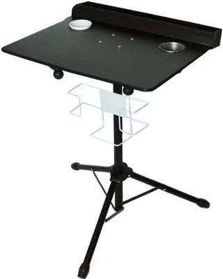 A black tattoo workstation on a tripod stand against a white background.