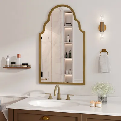 A bathroom vanity with a sink, faucet, and mirror.