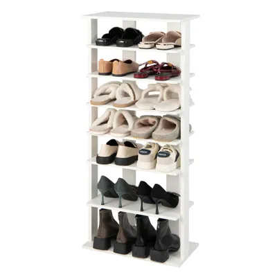 A white, multi-tiered shoe rack filled with various types of shoes.