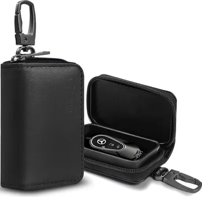 A black leather key pouch is shown open and closed, with a car key inside the open pouch.