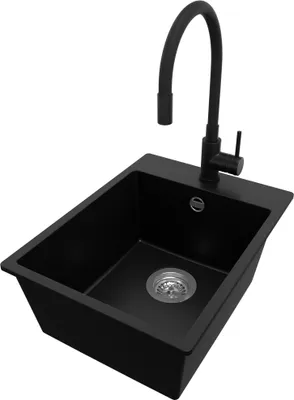 A black granite kitchen sink with a black faucet against a white background.