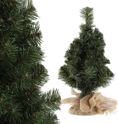A close-up view of a small artificial Christmas tree with a burlap base, shown next to a larger section of the same tree.