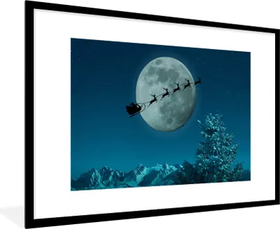 Produktbild von MuchoWow® Gerahmtes Poster Rentier mit Weihnachtsmann in der Luft 90x60 cm - Poster mit Schwarzem Bilderrahmen Wandposter Rahmen Foto Bilder - Wanddekoration - Fotos