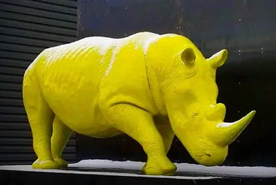 Produktbild von Casa Padrino XXL Deko Skulptur Nashorn Gelb 340 cm - Lebensgroße Garten Figur