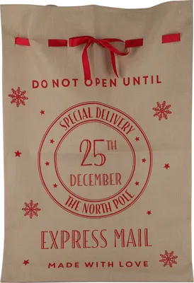 A Christmas gift bag with festive red lettering and designs.