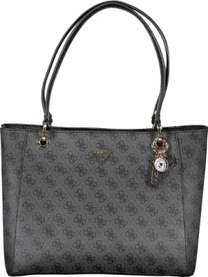 A studio shot of a grey Guess shopper bag with a repeating logo pattern and a key charm.